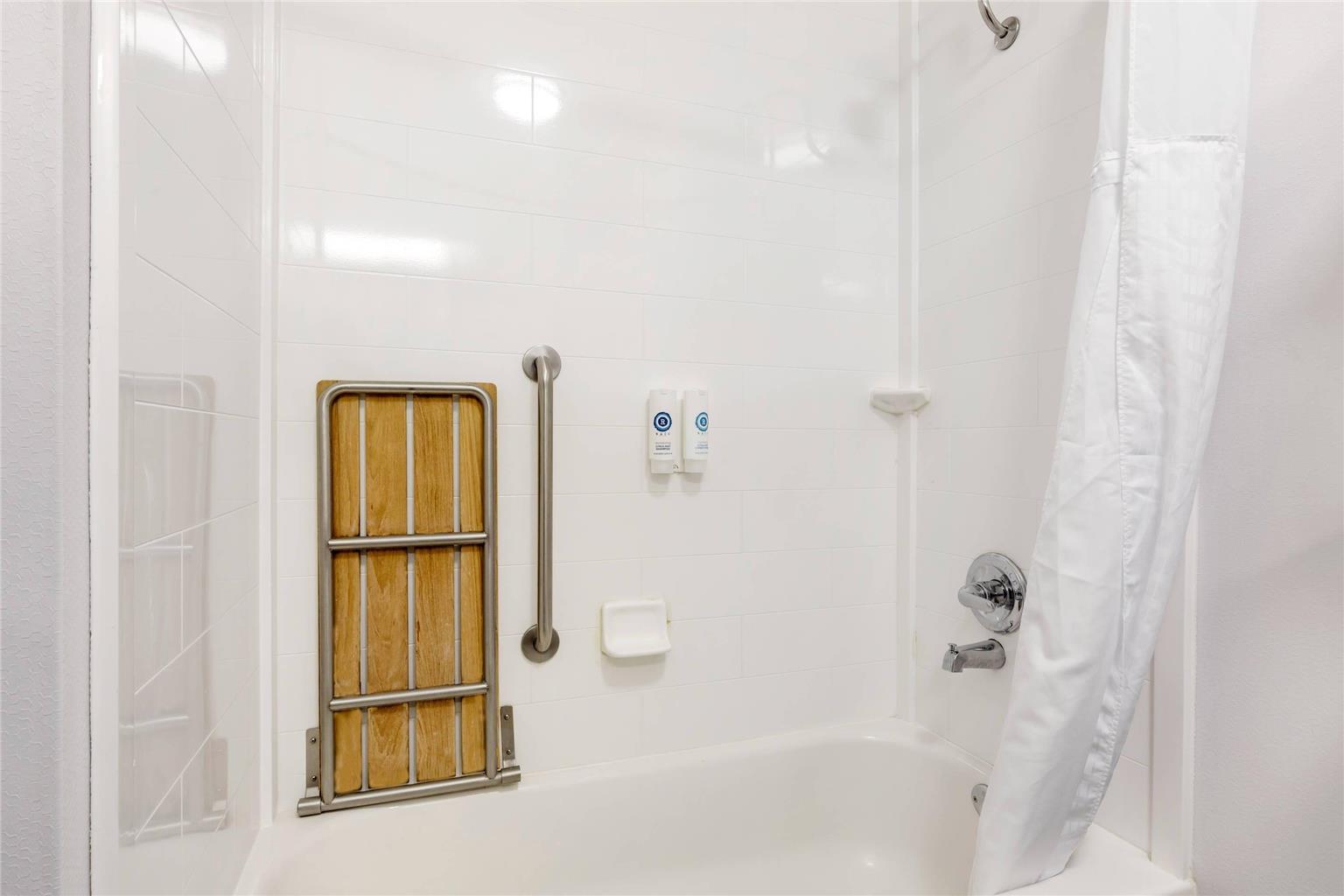 Accessible bathroom with tub at Comfort Inn Weatherford